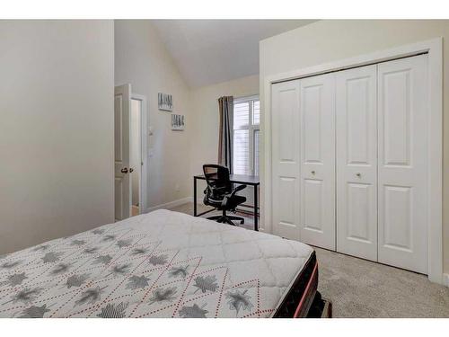 104-201 Muskrat Street, Banff, AB - Indoor Photo Showing Bedroom