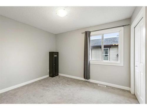 124 Willowmere Way Nw, Chestermere, AB - Indoor Photo Showing Other Room