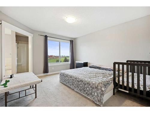 124 Willowmere Way Nw, Chestermere, AB - Indoor Photo Showing Bedroom