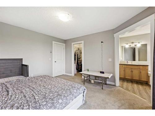 124 Willowmere Way Nw, Chestermere, AB - Indoor Photo Showing Bedroom