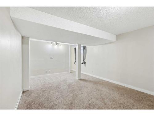 124 Willowmere Way Nw, Chestermere, AB - Indoor Photo Showing Other Room