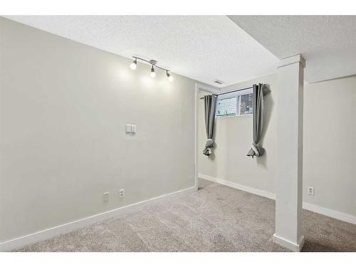 124 Willowmere Way Nw, Chestermere, AB - Indoor Photo Showing Other Room