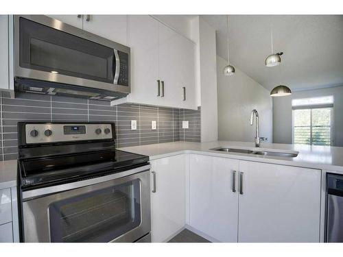 164 Walden Path Se, Calgary, AB - Indoor Photo Showing Kitchen With Stainless Steel Kitchen With Double Sink With Upgraded Kitchen