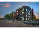 2307-755 Copperpond Boulevard Se, Calgary, AB  - Outdoor With Balcony With Facade 