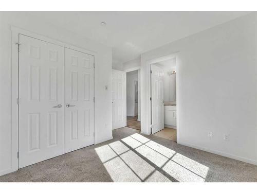 2307-755 Copperpond Boulevard Se, Calgary, AB - Indoor Photo Showing Bedroom