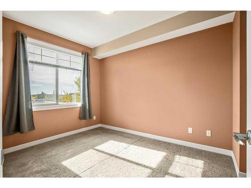 310-117 Copperpond Common Se, Calgary, AB - Indoor Photo Showing Other Room