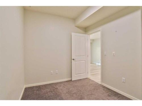 111-360 Harvest Hills Way Ne, Calgary, AB - Indoor Photo Showing Other Room