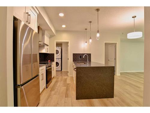 111-360 Harvest Hills Way Ne, Calgary, AB - Indoor Photo Showing Kitchen