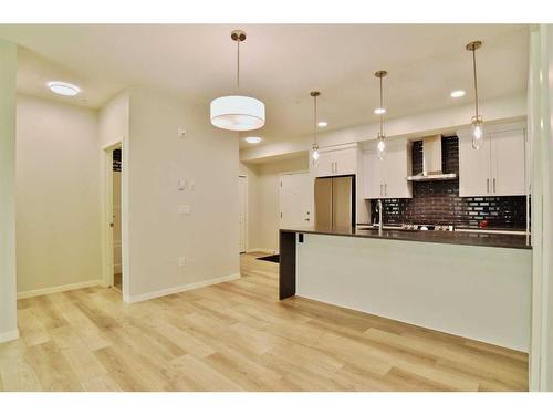 111-360 Harvest Hills Way Ne, Calgary, AB - Indoor Photo Showing Kitchen