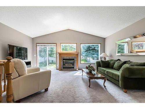 108 Chaparral Point Se, Calgary, AB - Indoor Photo Showing Living Room With Fireplace