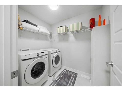 147-42 Cranbrook Gardens Se, Calgary, AB - Indoor Photo Showing Laundry Room