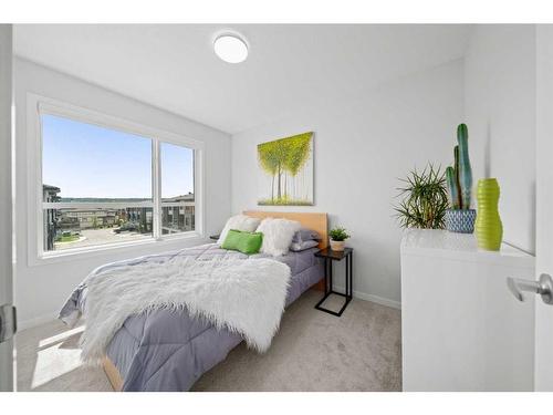 147-42 Cranbrook Gardens Se, Calgary, AB - Indoor Photo Showing Bedroom