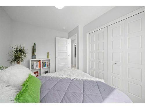 147-42 Cranbrook Gardens Se, Calgary, AB - Indoor Photo Showing Bedroom