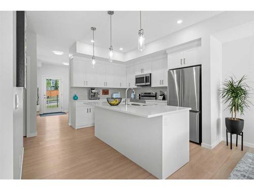 147-42 Cranbrook Gardens Se, Calgary, AB - Indoor Photo Showing Kitchen With Stainless Steel Kitchen With Upgraded Kitchen