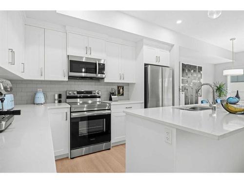 147-42 Cranbrook Gardens Se, Calgary, AB - Indoor Photo Showing Kitchen With Stainless Steel Kitchen With Upgraded Kitchen