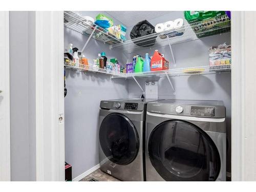 141 Cougar Ridge Circle Sw, Calgary, AB - Indoor Photo Showing Laundry Room