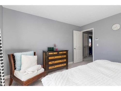 141 Cougar Ridge Circle Sw, Calgary, AB - Indoor Photo Showing Bedroom