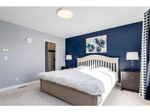 141 Cougar Ridge Circle Sw, Calgary, AB - Indoor Photo Showing Bedroom