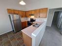 3 Alberta Avenue, Okotoks, AB  - Indoor Photo Showing Kitchen With Double Sink 