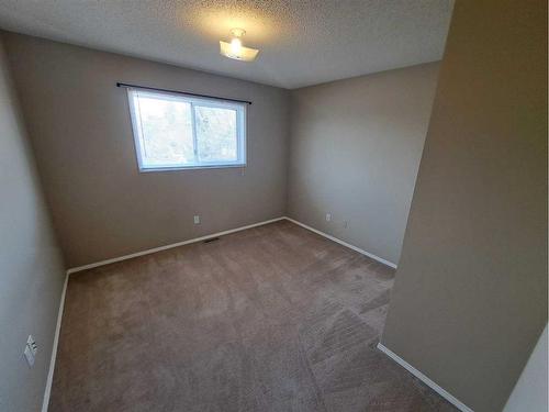 3 Alberta Avenue, Okotoks, AB - Indoor Photo Showing Other Room