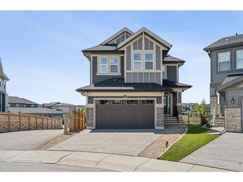 53 Sundown Grove, Cochrane, AB - Outdoor With Facade