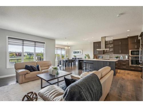 53 Sundown Grove, Cochrane, AB - Indoor Photo Showing Living Room