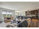 53 Sundown Grove, Cochrane, AB  - Indoor Photo Showing Living Room 