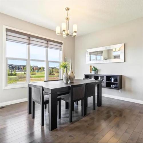 53 Sundown Grove, Cochrane, AB - Indoor Photo Showing Dining Room