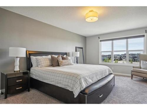 53 Sundown Grove, Cochrane, AB - Indoor Photo Showing Bedroom