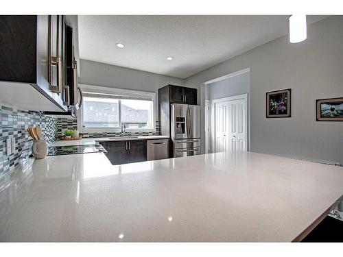 590 Hillcrest Road Sw, Airdrie, AB - Indoor Photo Showing Kitchen With Stainless Steel Kitchen