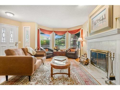 1777 1 Avenue Nw, Calgary, AB - Indoor Photo Showing Living Room With Fireplace