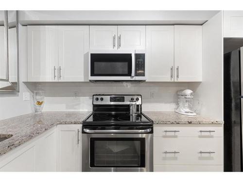 2302-99 Copperstone Park Se, Calgary, AB - Indoor Photo Showing Kitchen With Upgraded Kitchen