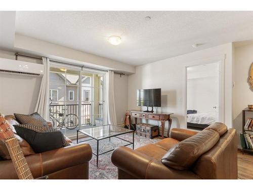 2302-99 Copperstone Park Se, Calgary, AB - Indoor Photo Showing Living Room