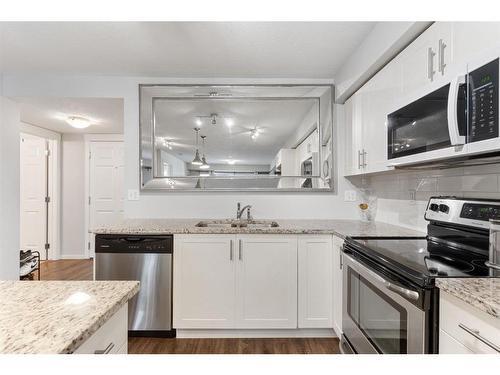 2302-99 Copperstone Park Se, Calgary, AB - Indoor Photo Showing Kitchen With Double Sink With Upgraded Kitchen