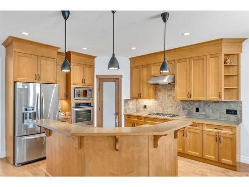 164 Kinniburgh Boulevard, Chestermere, AB - Indoor Photo Showing Kitchen With Stainless Steel Kitchen With Upgraded Kitchen