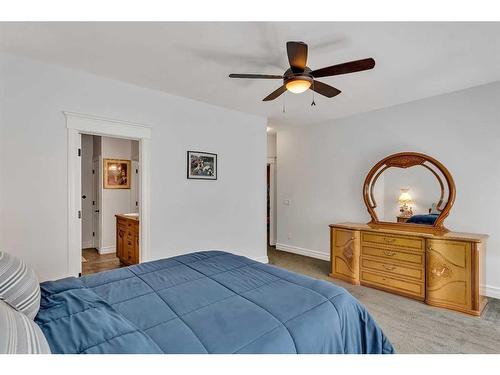 164 Kinniburgh Boulevard, Chestermere, AB - Indoor Photo Showing Bedroom