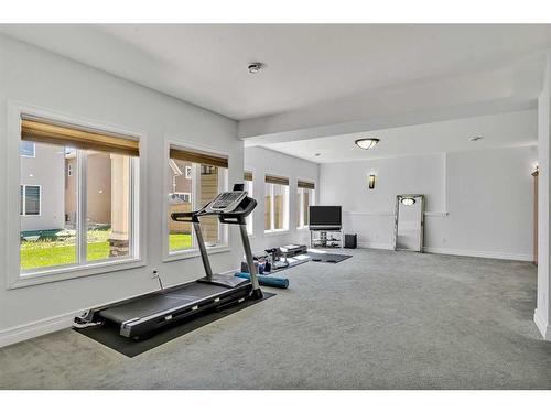 164 Kinniburgh Boulevard, Chestermere, AB - Indoor Photo Showing Gym Room