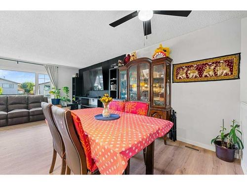 415 Penbrooke Crescent Se, Calgary, AB - Indoor Photo Showing Dining Room