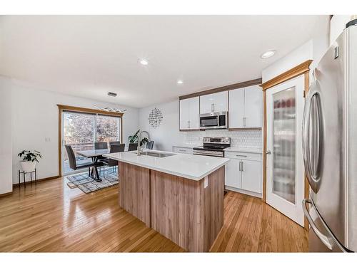 466 Bridlemeadows Common Sw, Calgary, AB - Indoor Photo Showing Kitchen With Stainless Steel Kitchen With Double Sink