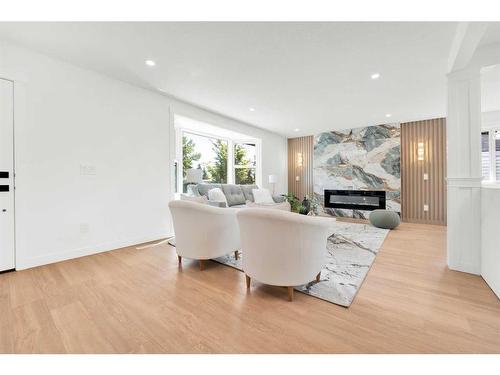 4323 19 Street Nw, Calgary, AB - Indoor Photo Showing Living Room With Fireplace