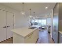 213-8505 Broadcast Avenue Sw, Calgary, AB  - Indoor Photo Showing Kitchen With Double Sink 