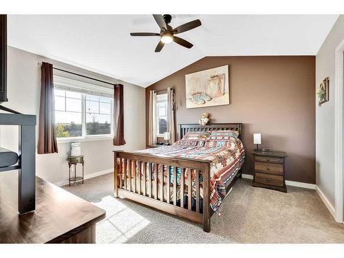 2399 Reunion Street Nw, Airdrie, AB - Indoor Photo Showing Bedroom