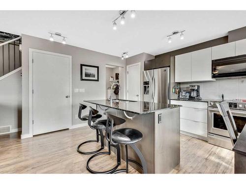 2399 Reunion Street Nw, Airdrie, AB - Indoor Photo Showing Kitchen With Stainless Steel Kitchen With Upgraded Kitchen