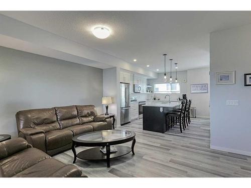 306 Harvest Grove Ne, Calgary, AB - Indoor Photo Showing Living Room