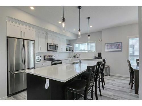 306 Harvest Grove Ne, Calgary, AB - Indoor Photo Showing Kitchen With Stainless Steel Kitchen With Double Sink With Upgraded Kitchen