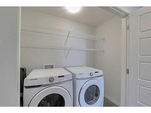 306 Harvest Grove Ne, Calgary, AB - Indoor Photo Showing Laundry Room