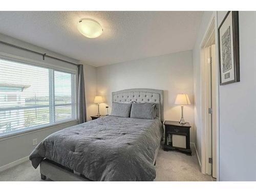 306 Harvest Grove Ne, Calgary, AB - Indoor Photo Showing Bedroom