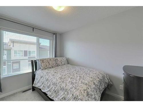 306 Harvest Grove Ne, Calgary, AB - Indoor Photo Showing Bedroom