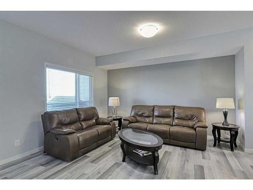 306 Harvest Grove Ne, Calgary, AB - Indoor Photo Showing Living Room