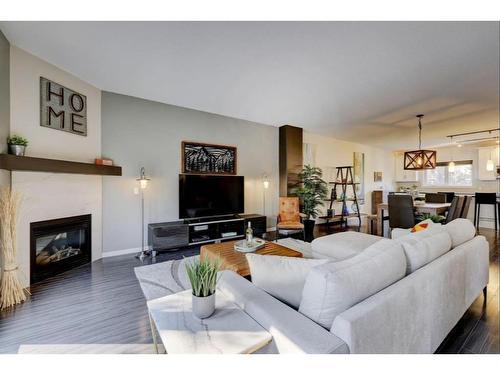 207 Valley Ridge Manor Nw, Calgary, AB - Indoor Photo Showing Living Room With Fireplace